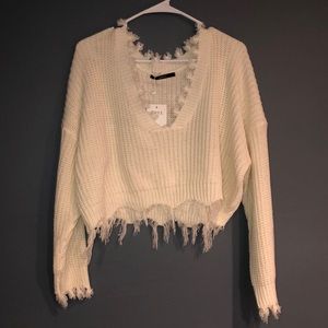 Distressed crop top sweater